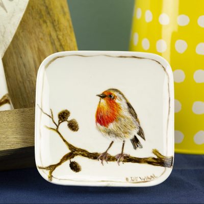 Image of a painted robin with porcelain paint